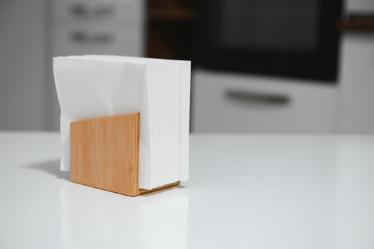 Wooden napkin holder in kitchen photo