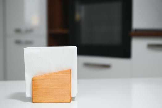 Wooden napkin holder in kitchen photo