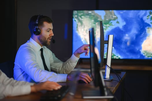 Police dispatch, communication headset and man talking, speaking and consulting with security photo