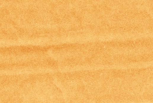 Crumpled brown kraft paper texture banner background photo