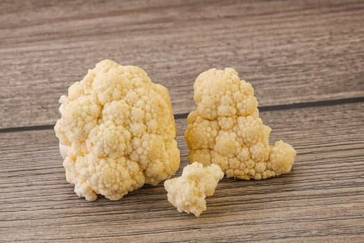 Raw white cauliflower cabbage heap photo
