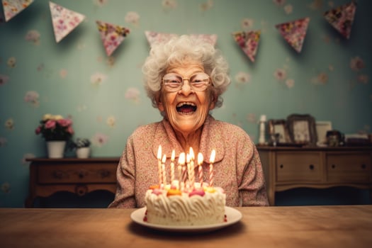 AI generated an elderly woman blows out the candles on a birthday cake at her home photo