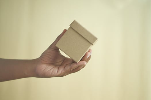 hand holding a empty gift box photo