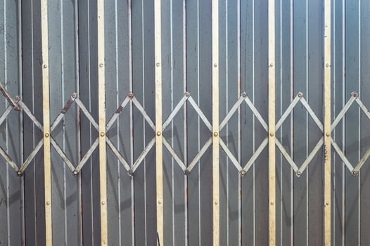 an iron harmonica door or rolling door or folding door photo