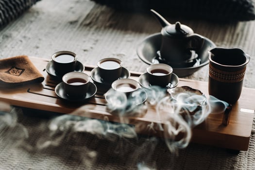 Tea ceremony with smoking incense. Incense stick and tea ceremony photo