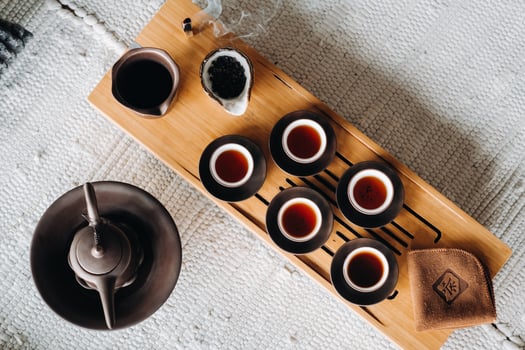 Preparing for a tea ceremony with a large company photo