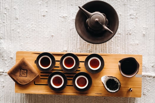 Preparing for a tea ceremony with a large company photo