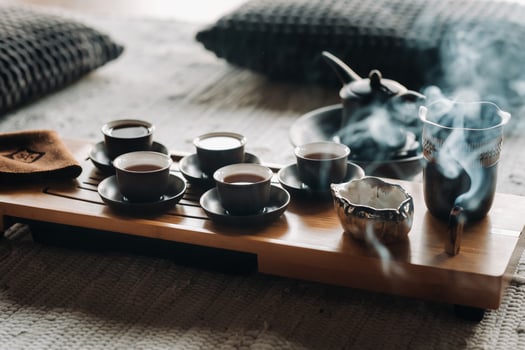 Tea ceremony with smoking incense. Incense stick and tea ceremony photo