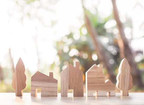 Miniature house for Property investment, House mortgage, Real estate concept photo