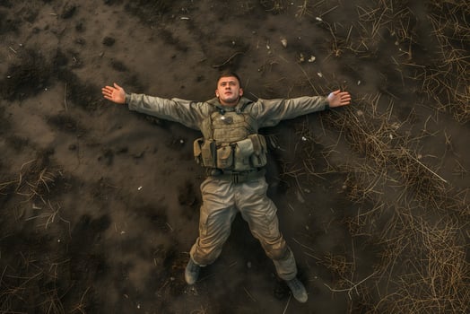 AI Generated soldier laid on the battlefield, view from above, drone point of view photo