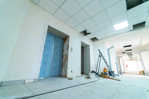 New building under construction. Room at the repair period during the day. Full length view photo