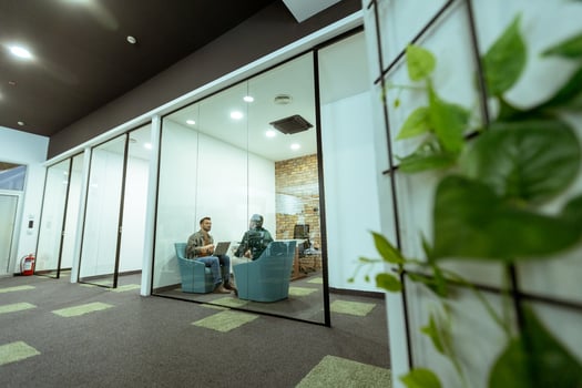 Casual Business Meeting in a Modern Office Lounge photo