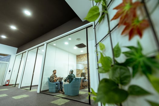 Casual Business Meeting in a Modern Office Lounge photo