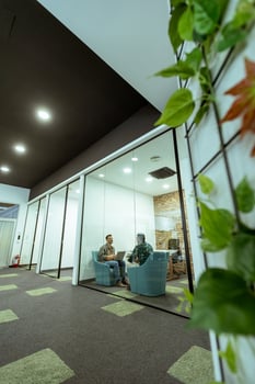 Casual Business Meeting in a Modern Office Lounge photo