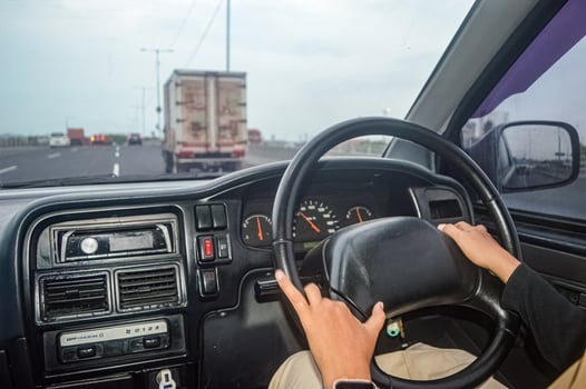a woman who was driving a car on the toll road photo
