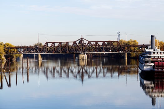 Sacramento, CA, 2012 - Railroad Bridge Over Sacramento River With Reflection photo