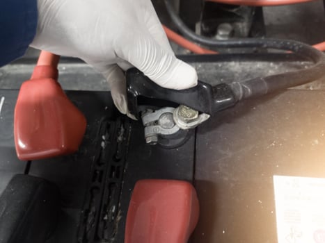 Checking and Maintenance battery pole terminals .Open the plastic protection terminals battery.Negative pole. photo