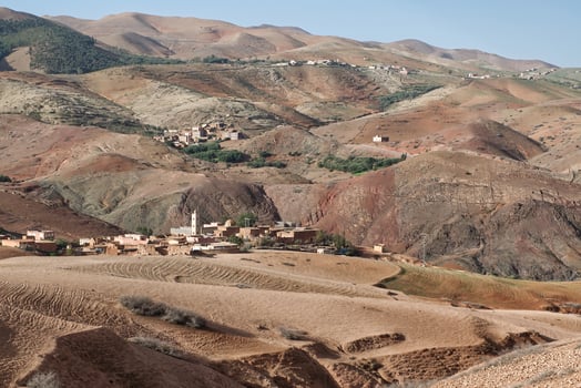 Landscape of desert, mountains and village in Atlas Mountains Morocco near Marrakech. photo