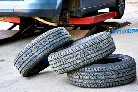 Service for the repair and replacement of a car wheel at a tire station photo