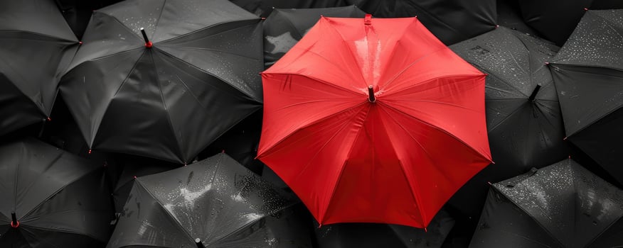 AI generated A red umbrella among the black umbrellas. Contrast concept. photo