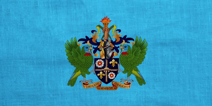 Flag and coat of arms of Saint Lucia textured background. Concept collage. photo