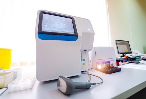 Modern automatic machine. Centrifuge for blood and urine testing. Closeup photo
