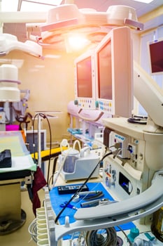 Artificial lung ventilation monitor in the intensive care unit. Nurse with medical equipment. Ventilation of the lungs with oxygen. COVID-19 and coronavirus identification. Pandemic. photo
