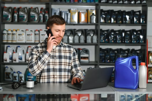 Smiling Salesman Auto Parts Store photo