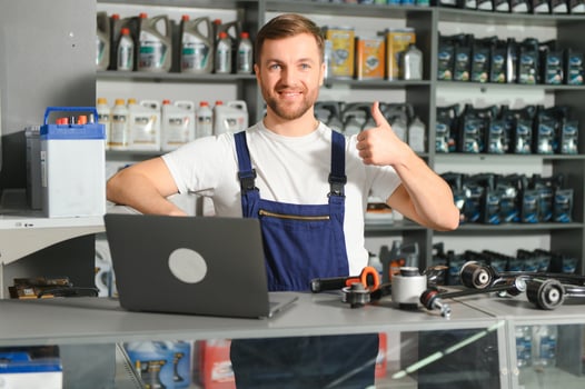Smiling Salesman Auto Parts Store photo