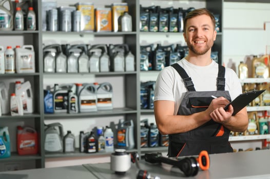 Smiling Salesman Auto Parts Store photo
