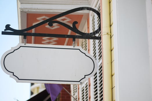 Street signboard mockup on modern city building photo
