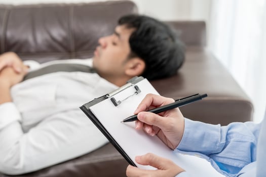man with mental health problems is consulting. psychiatrist is recording the patient's condition for treatment. encouragement, love and family problem, bipolar , depression patient, protect suicide photo