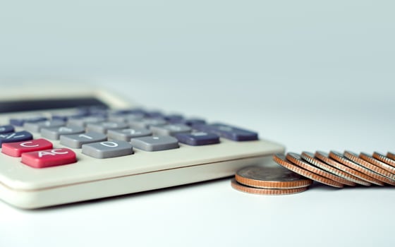 Documents and calculator on the white background, Investment planning, Business and finance concept, Money bank concept, Tax. Concept of financial, Savings, Investments, Funding. photo