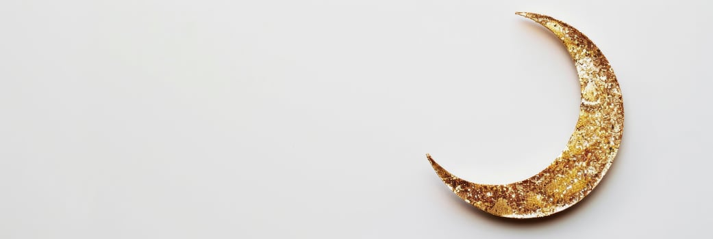 AI generated Eid Golden Half Moon Against a White Background, Evoking the Spirit of Celebration. photo