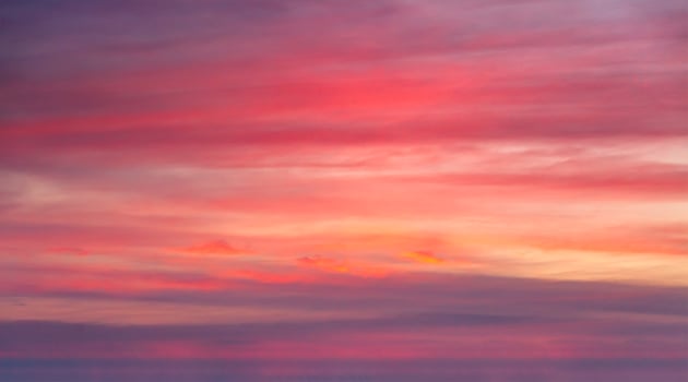 Sunset sky with red clouds photo