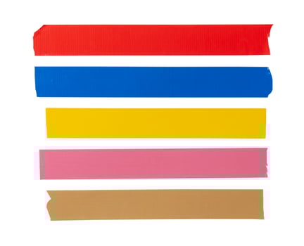 Top view set of multicolor adhesive vinyl tape or cloth tape in stripe shape isolated on white background with clipping path photo