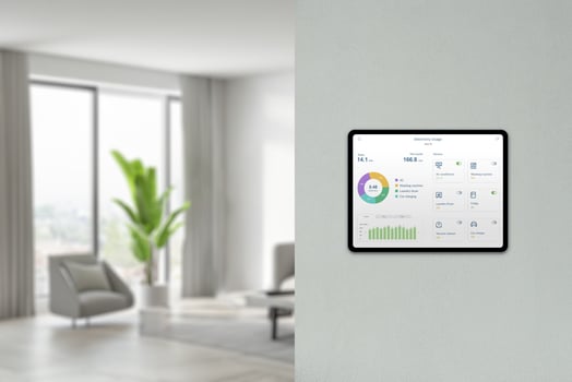 Tablet displays energy consumption and device analysis in home on wall with living room background. Concept of smart home technology photo