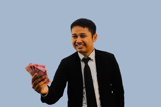 Adult Asian man smiling happy giving money photo
