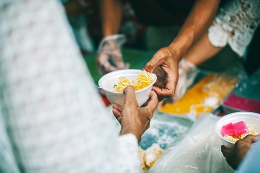 The concept of humanitarian assistance sharing food to the poor photo