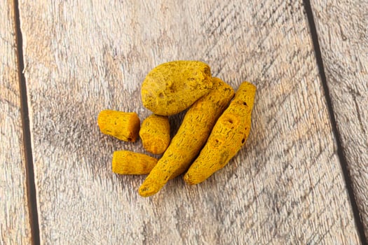 Indian spices - Turmeric root Curcuma photo