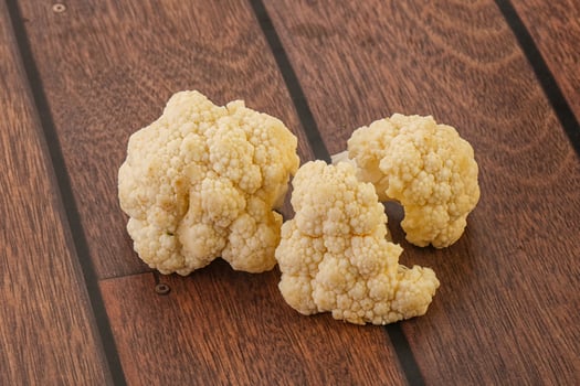 Raw white cauliflower cabbage heap photo