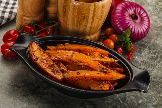Baked batat with with spices photo