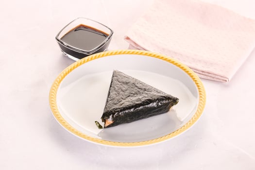 Japanese traditional onigiri with fish photo