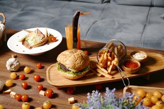 Wooden Tray With Sandwich and French Fries photo