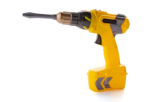 Yellow plastic toy drill screwdriver with bit isolated on white background photo