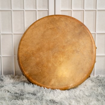 handmade, native American style, shaman frame drum covered by goat skin photo