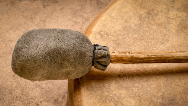 detail of handmade, native American style, shaman frame drum with a beater photo