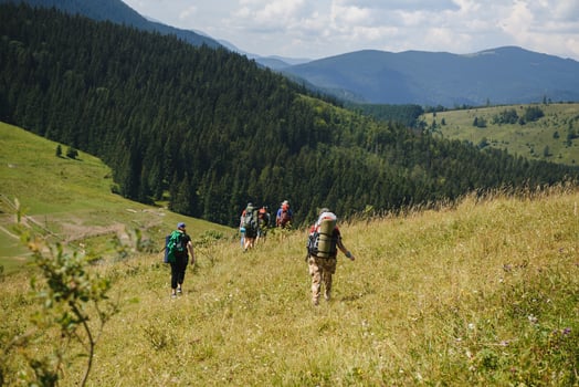 Hiking team in the mountains. travel sport lifestyle concept photo