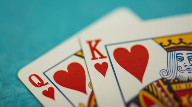 AI generated Hearts Royalty. Two Playing Cards Featuring the Queen and King of Hearts, Symbolizing Romance and Royalty in the Deck. photo
