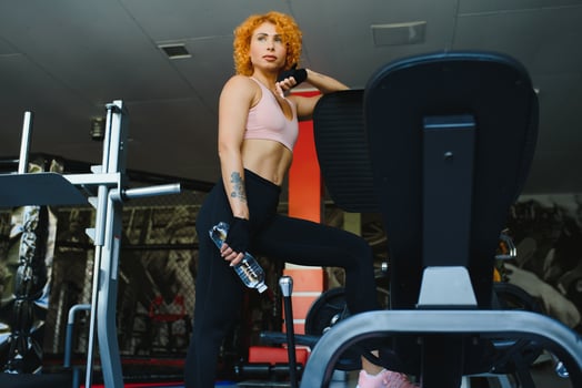 Close up image of attractive fit woman in gym photo